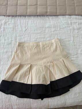 Free People Pleated Two-Tone Mini Shorts in Cream and Black